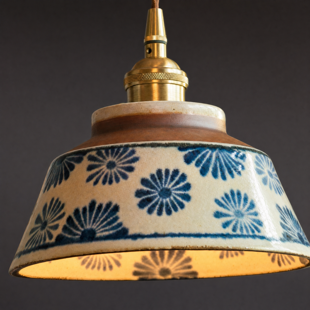 Close-up of the Riva pendant shade showing the hand-applied indigo floral pattern