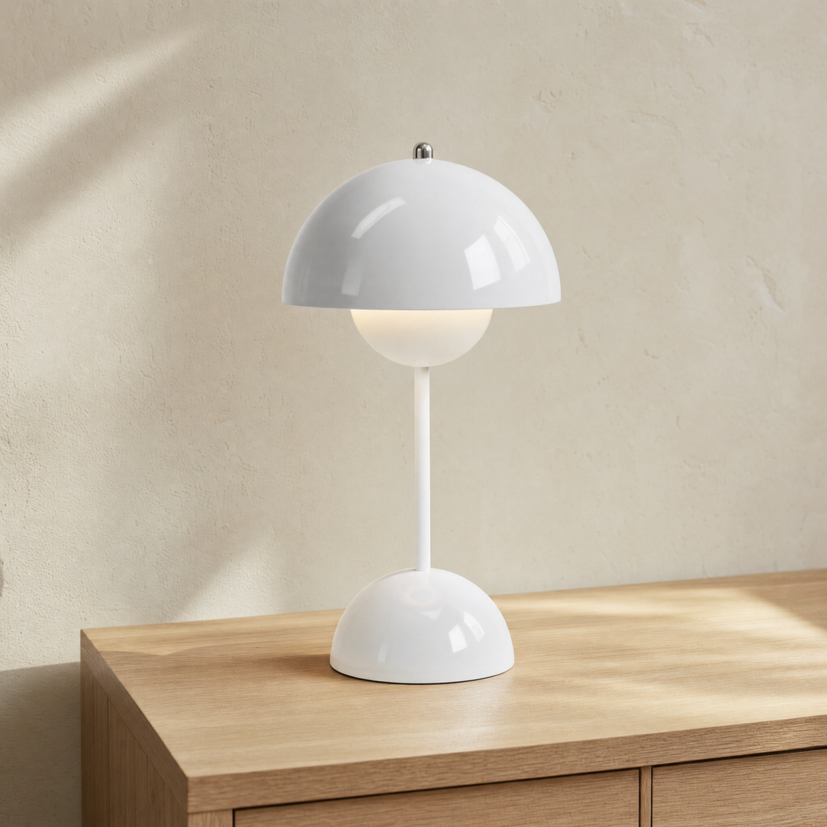 Nimba cordless table lamp in White on a light oak table
